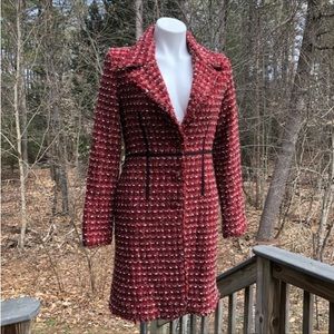 Red lined and shaped long bouclé coat size 6